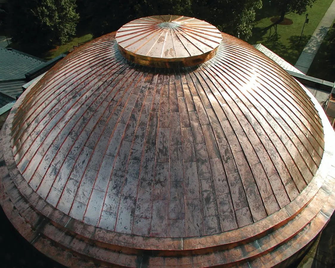 Craftsman Roofing crew installing a new roof in Woodsville